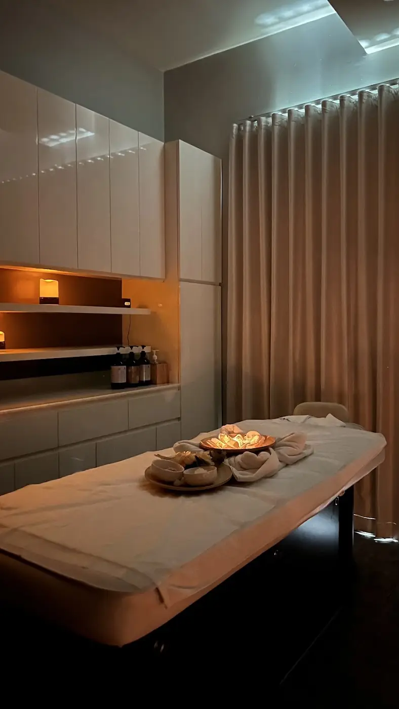 A candle-lit massage room