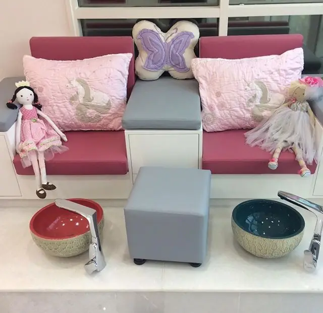The children's pamper corner with small pedicure chairs